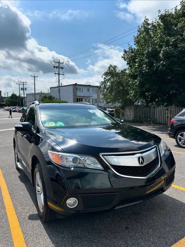 Black Acura SUV after detailing